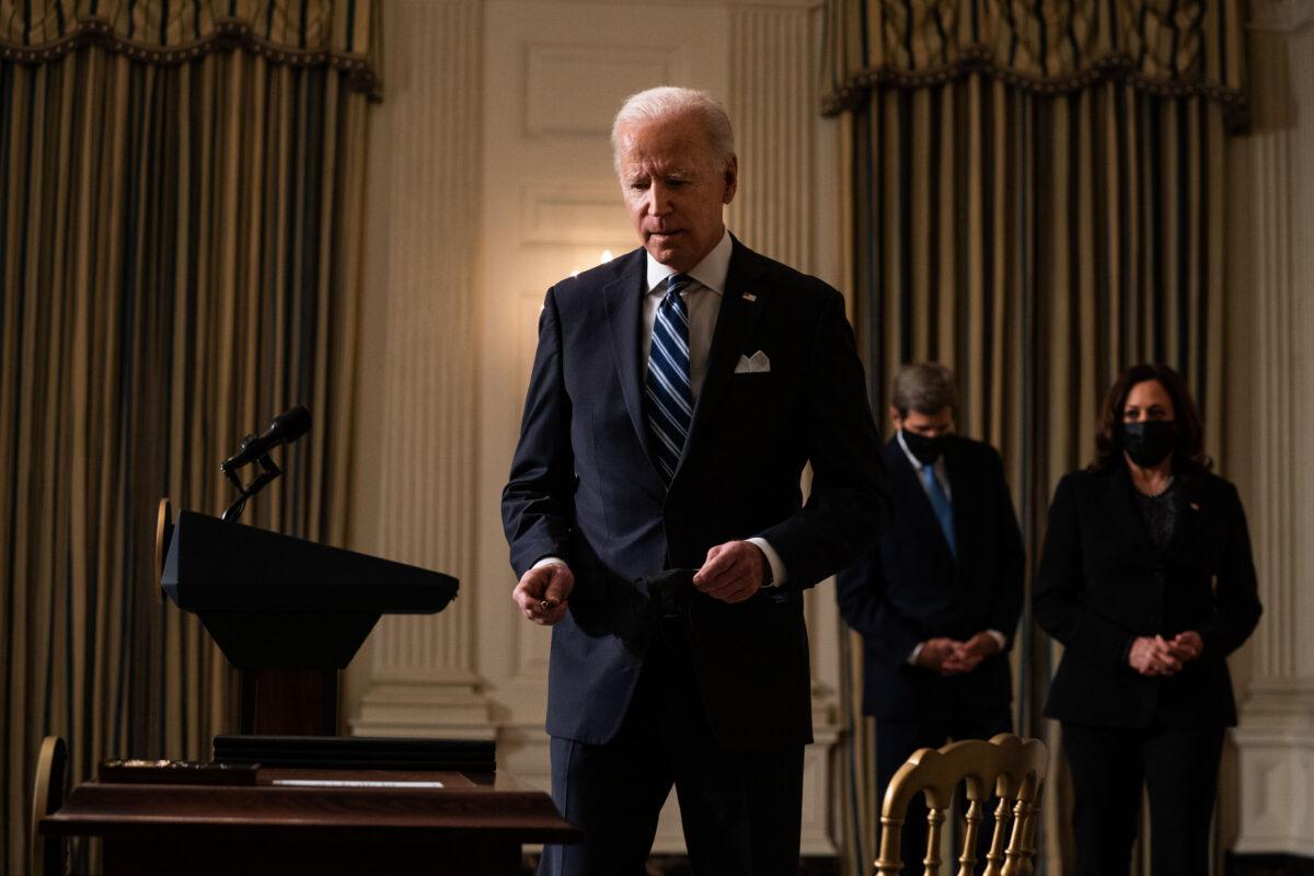 President Joe Biden prepares to sign executive orders after speaking about climate change issues at the White House on Jan. 27, 2021.  (Anna Moneymaker-Pool/Getty Images)