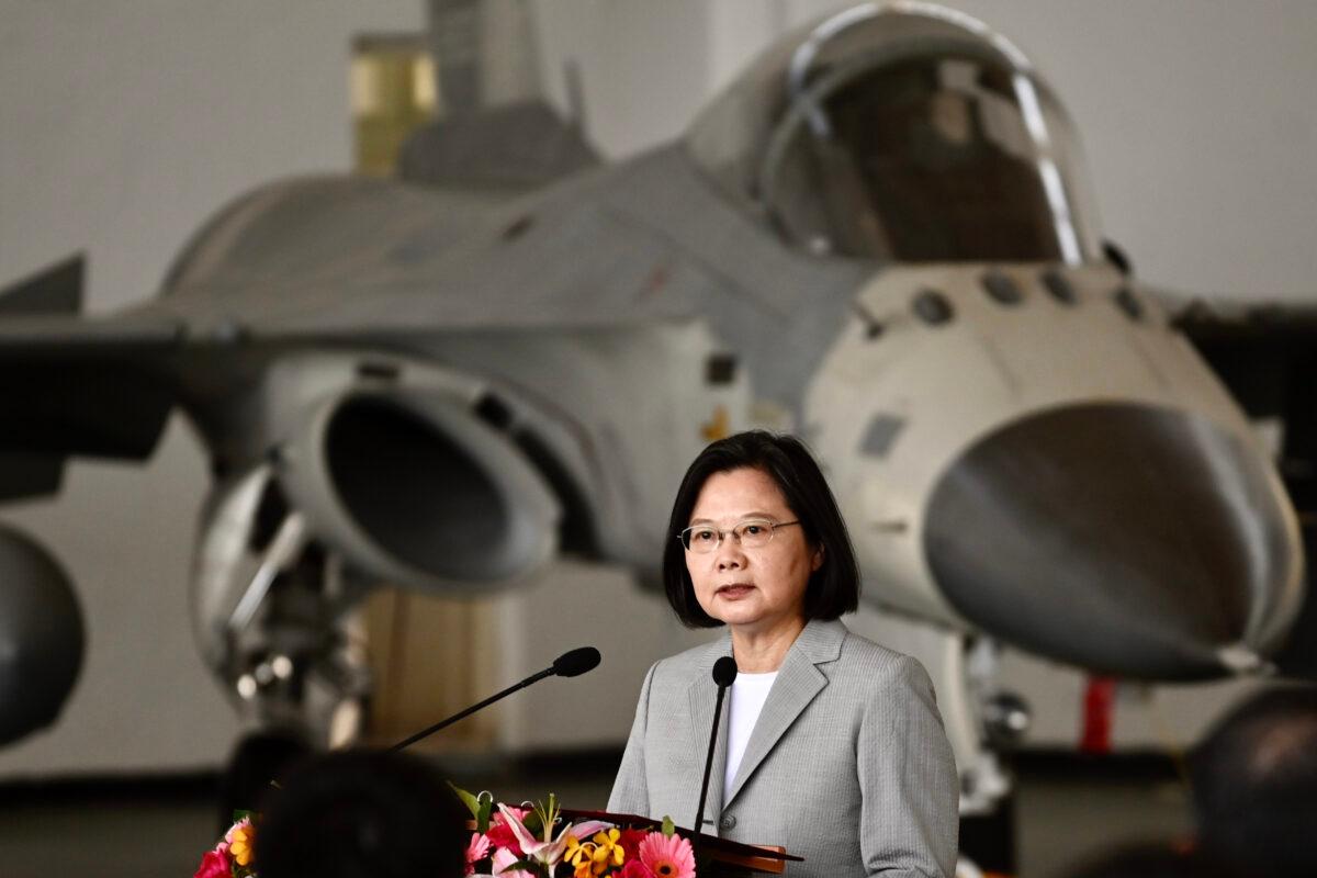 Taiwan's President Tsai Ing-wen speaks in front of a domestically-manufactured F-CK-1 indigenous defense fighter jet during her visit to Penghu Air Force Base, Taiwan, on Sept. 20, 2020. (Sam Yeh/AFP via Getty Images)
