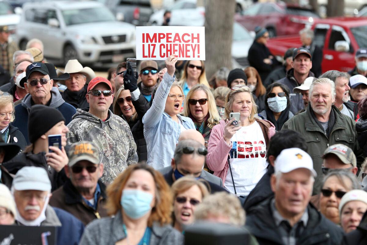 A protester shouts in agreement with Rep. Matt Gaetz (R-Fla.) as he gives a speech during a rally against Rep. Liz Cheney (R-Wyo.) outside the Wyoming State Capitol in Cheyenne, Wyo., on Jan. 28, 2021. (Michael Cummo/The Wyoming Tribune Eagle via AP)