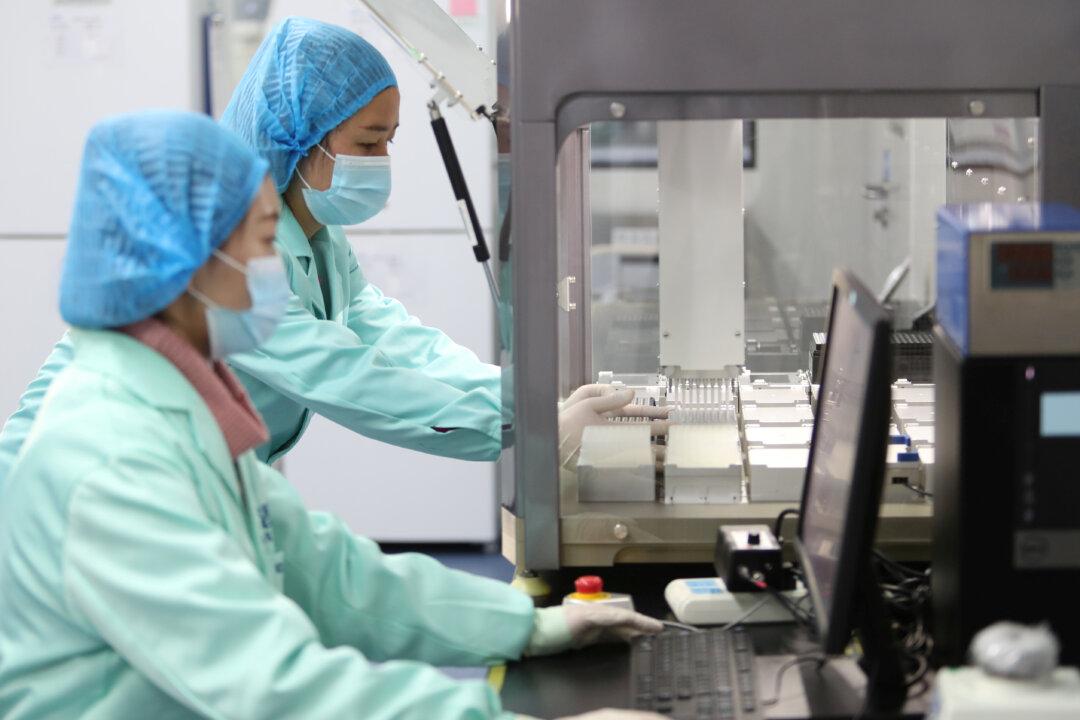 China Gene Firm Providing Worldwide COVID Tests Worked With Chinese Military
