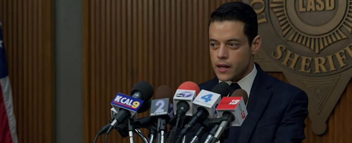 Detective Jimmy Baxter (Rami Malek) talks to the press, in "The Little Things." (Warner Bros.)