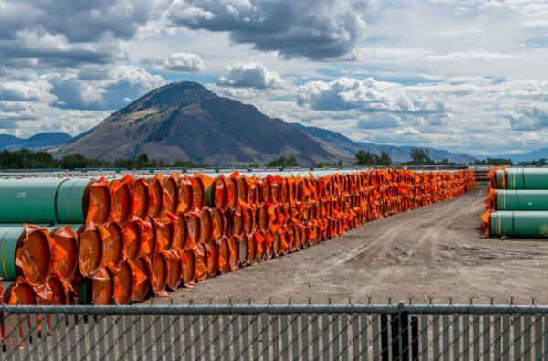 Steel pipes to be used in the oil pipeline construction of the Canadian government’s Trans Mountain Expansion Project lies at a stockpile site in Kamloops, B.C., on June 18, 2019. (Dennis Owen/Reuters)