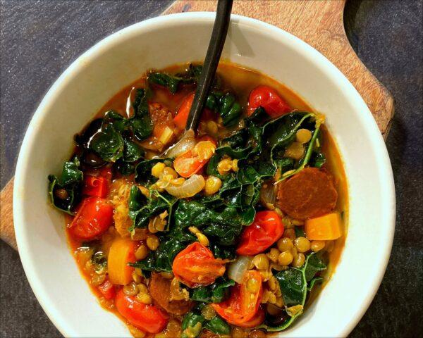 Spicy chorizo, hearty kale, and fiery harissa take this simple lentil soup to new heights. (Lynda Balslev for Tastefood)