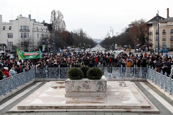 People attend a demonstration against the coronavirus disease (COVID-19) measures and their economic consequences at Heroes' Square in Budapest, Hungary, on Jan. 31, 2021. (Bernadett Szabo/Reuters)