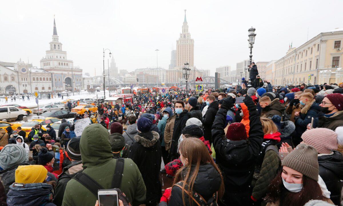 People attend a protest against the jailing of opposition leader Alexei Navalny in Moscow, Russia, on Jan. 31, 2021. (Alexander Zemlianichenko/AP Photo)