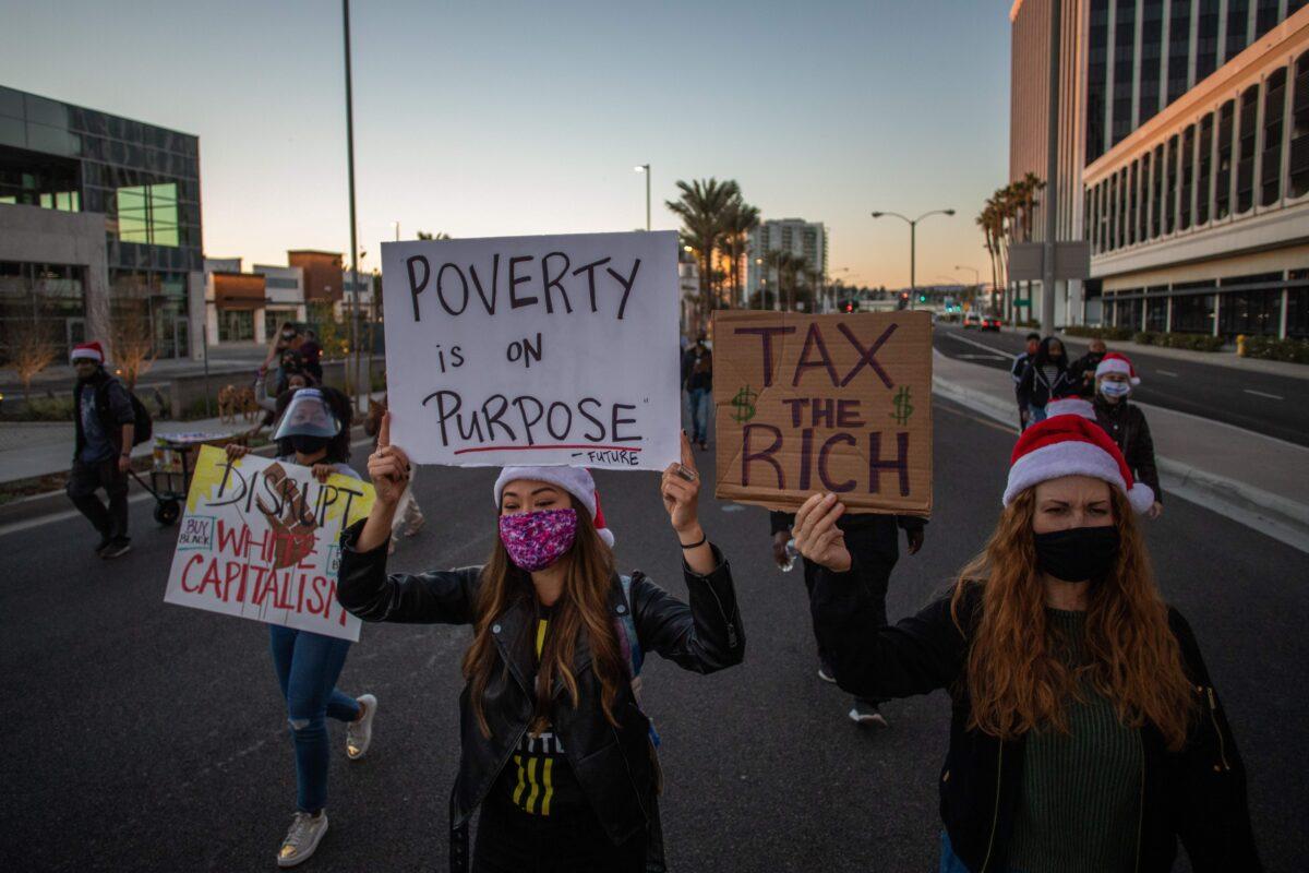Protesters march in Los Angeles during a Black Lives Matter rally to demand social justice on Dec. 19, 2020. (Apu Gomes/AFP via Getty Images)
