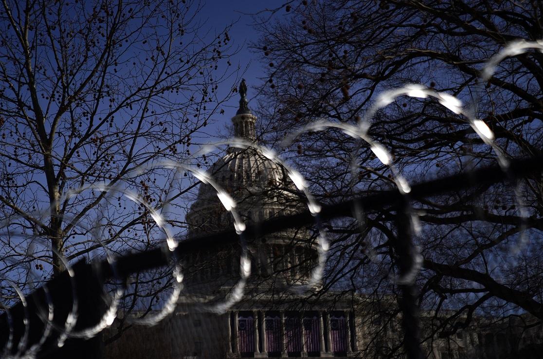 Concertina wire tops security fencing around U.S. Capitol in Washington on Jan. 16, 2021. (Eric Thayer/Getty Images)