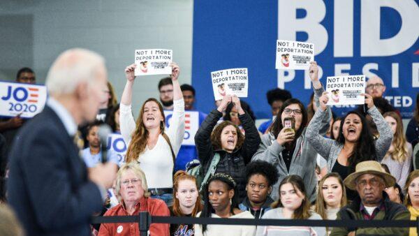 Protesters against deportations interrupt then-presidential candidate Joe Biden during a town hall in Greenwood, S.C., on Nov. 21, 2019. (Sean Rayford/Getty Images)