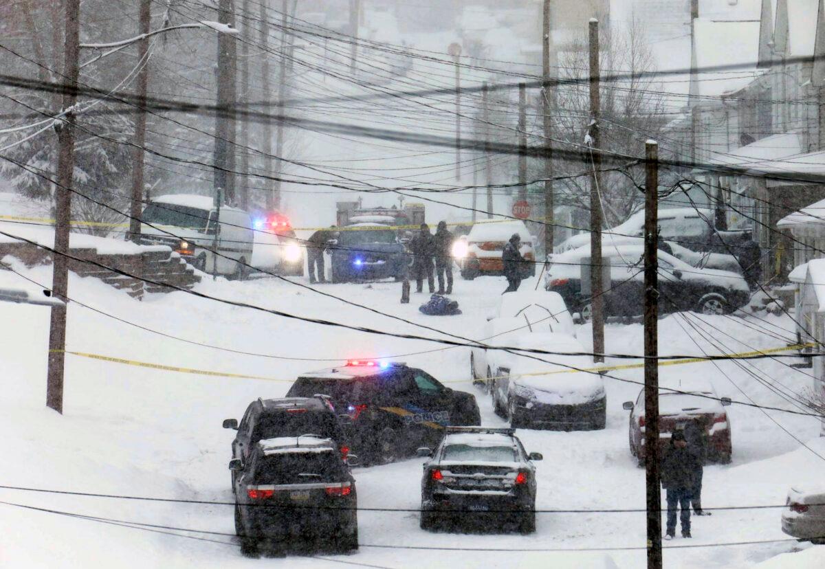 Authorities converge on the scene of a double homicide and apparent suicide on Bergh Street, in Plains, Pa., on Feb. 1, 2021. (Dave Scherbenco/The Citizens' Voice via AP)