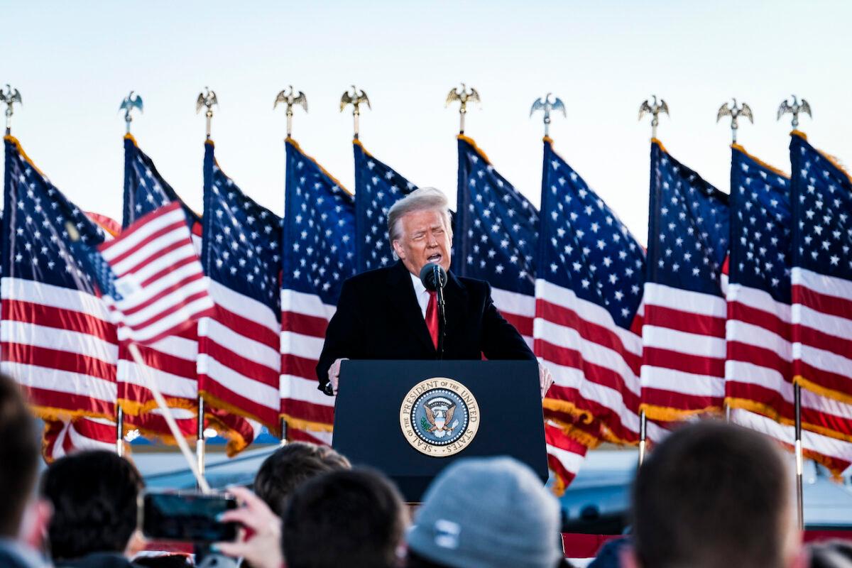 President Donald Trump speaks to supporters before boarding Air Force One for his last time as president at Joint Base Andrews, Md., on Jan. 20, 2021. (Pete Marovich/Pool/Getty Images)