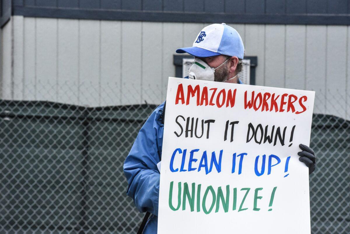 People protest working conditions outside of an Amazon fulfillment center in New York City on May 1, 2020. (Stephanie Keith/Getty Images)