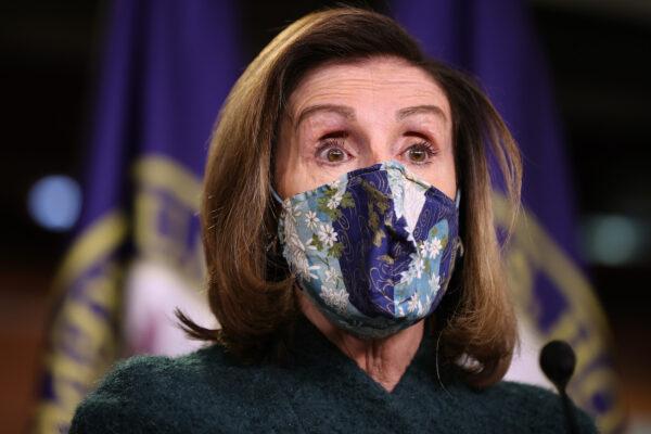 Speaker of the House Nancy Pelosi (D-Calif.) holds her weekly news conference in the U.S. Capitol Visitors Center in Washington, on Jan. 28, 2021. (Chip Somodevilla/Getty Images)