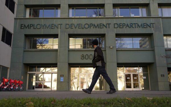 A person passes the office of the California Employment Development Department in Sacramento, Calif., on Dec. 18, 2020. (Rich Pedroncelli/AP Photo)