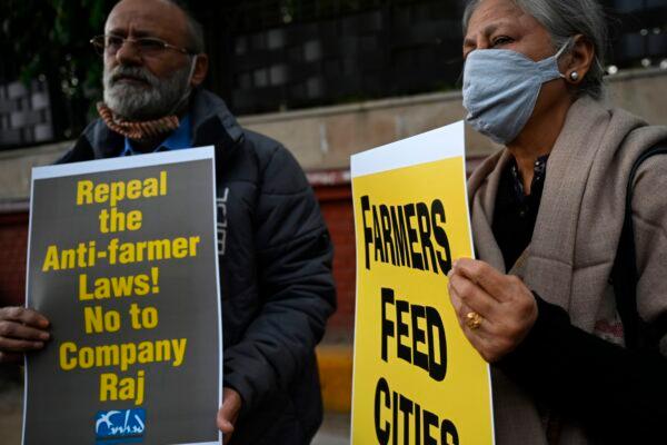 Demonstrators participate in a march organised in support of farmers protesting against the central government's recent agricultural reforms in New Delhi, India on Feb. 3, 2021. (Money SHARMA / AFP) (Photo by MONEY SHARMA/AFP via Getty Images)