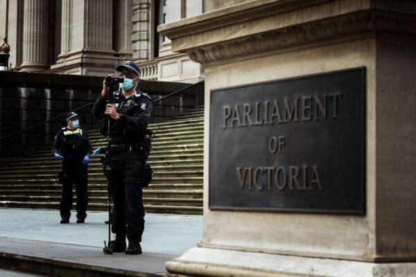 Police patrol at Parliament House in expectation of anti lockdown protesters in Melbourne, Australia on Sept. 5, 2020. (Darrian Traynor/Getty Images)