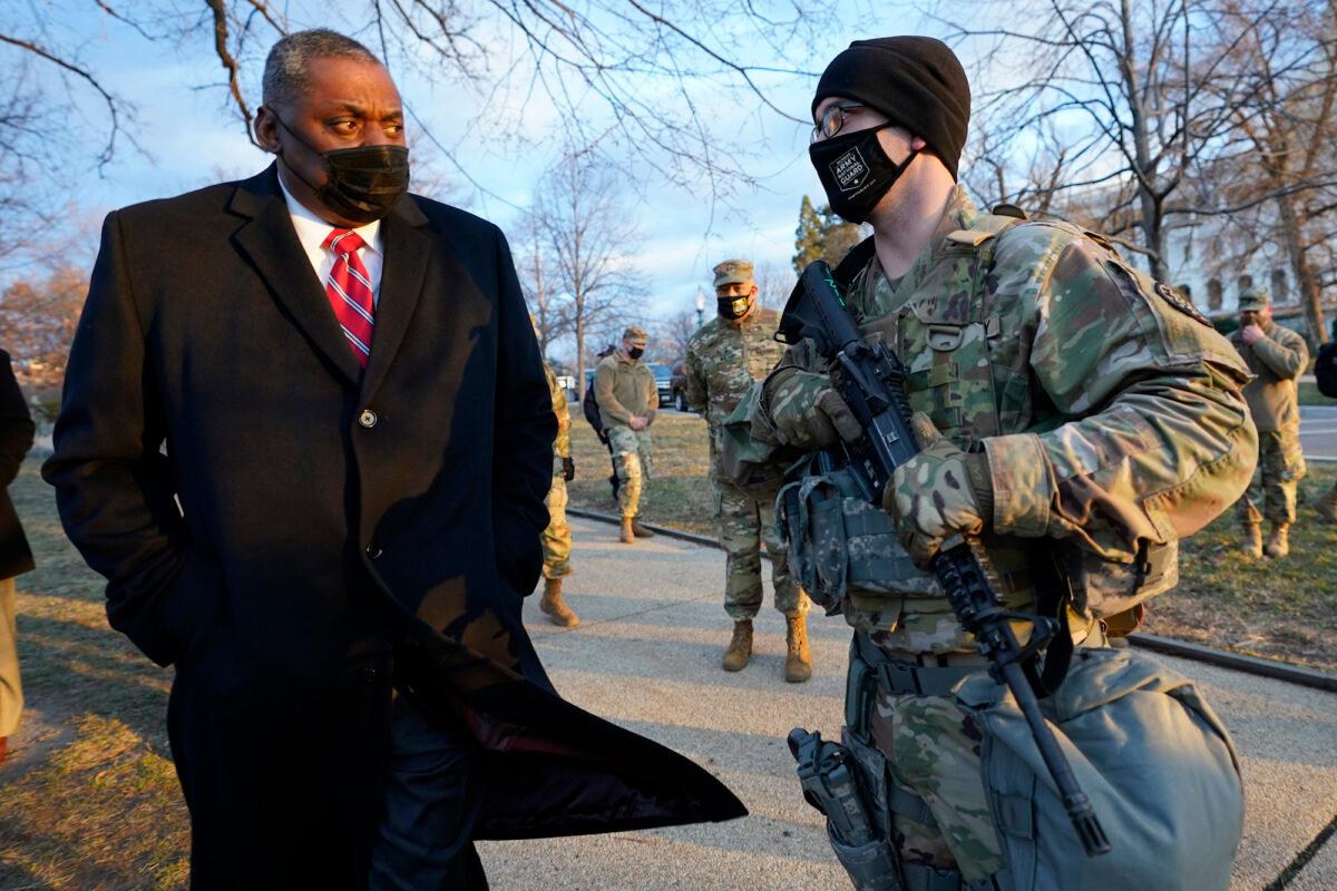 Secretary of Defense Lloyd Austin visits National Guard troops deployed at the U.S. Capitol and its perimeter, in Washington, on Jan. 29, 2021. (Manuel Balce Ceneta/AP Photo)