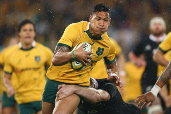 SYDNEY, AUSTRALIA - AUGUST 16: Israel Folau of the Wallabies runs the ball during The Rugby Championship match between the Australian Wallabies and the New Zealand All Blacks at ANZ Stadium on August 16, 2014 in Sydney, Australia. (Photo by Mark Kolbe/Getty Images)