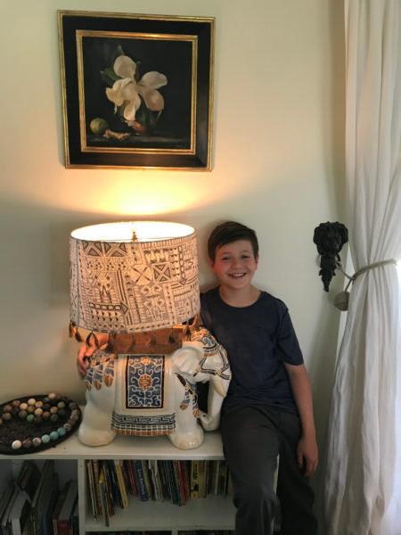 The author, with the elephant in its new incarnation as a lamp. (Courtesy of John Falce)