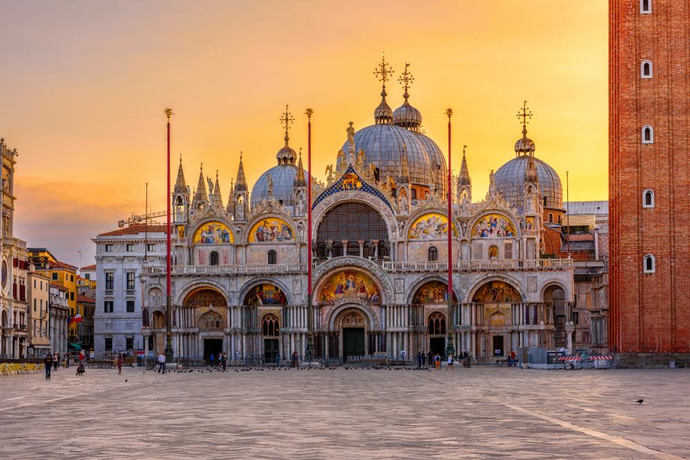 A spectacular sunrise highlights the sublime art and architecture of the basilica. (Catarina Belova/Shutterstock.com)
