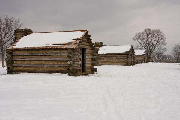 Reproductions of the rustic cabins used by Revolutionary War soldiers under command of General Washington during the winter of 1777–78. Valley Forge National Historic Park, Pennsylvania. (Traci Law/Shutterstock)