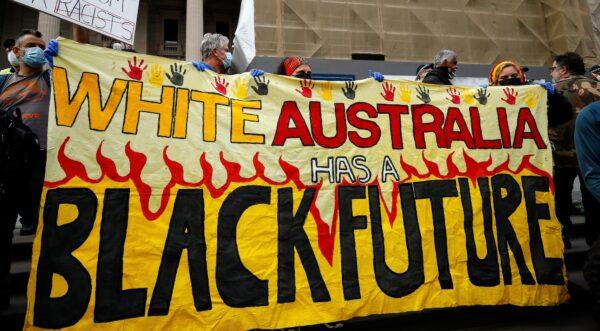 Demonstrators attend a Black Lives Matter protest following protests in the United States in Melbourne on June 6, 2020. (Con Chronis/AFP via Getty Images)