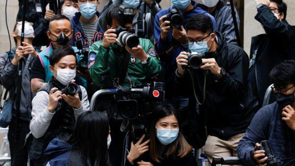 Media wait for media mogul Jimmy Lai to arrive at the Court of Final Appeal for a bail hearing in Hong Kong on Feb. 9, 2021. (Tyrone Siu/Reuters)