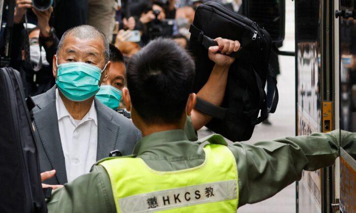 Media mogul Jimmy Lai leaves the Court of Final Appeal by prison van in Hong Kong, on Feb. 9, 2021. (Tyrone Siu/Reuters)