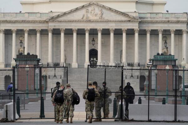 Members of the National Guard patrol at the U.S. Capitol in Washington on Feb. 9, 2021. (Reuters/Joshua Roberts)