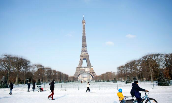 Eiffel Tower Needs Blowtorch for Ice as Snow Blankets Europe