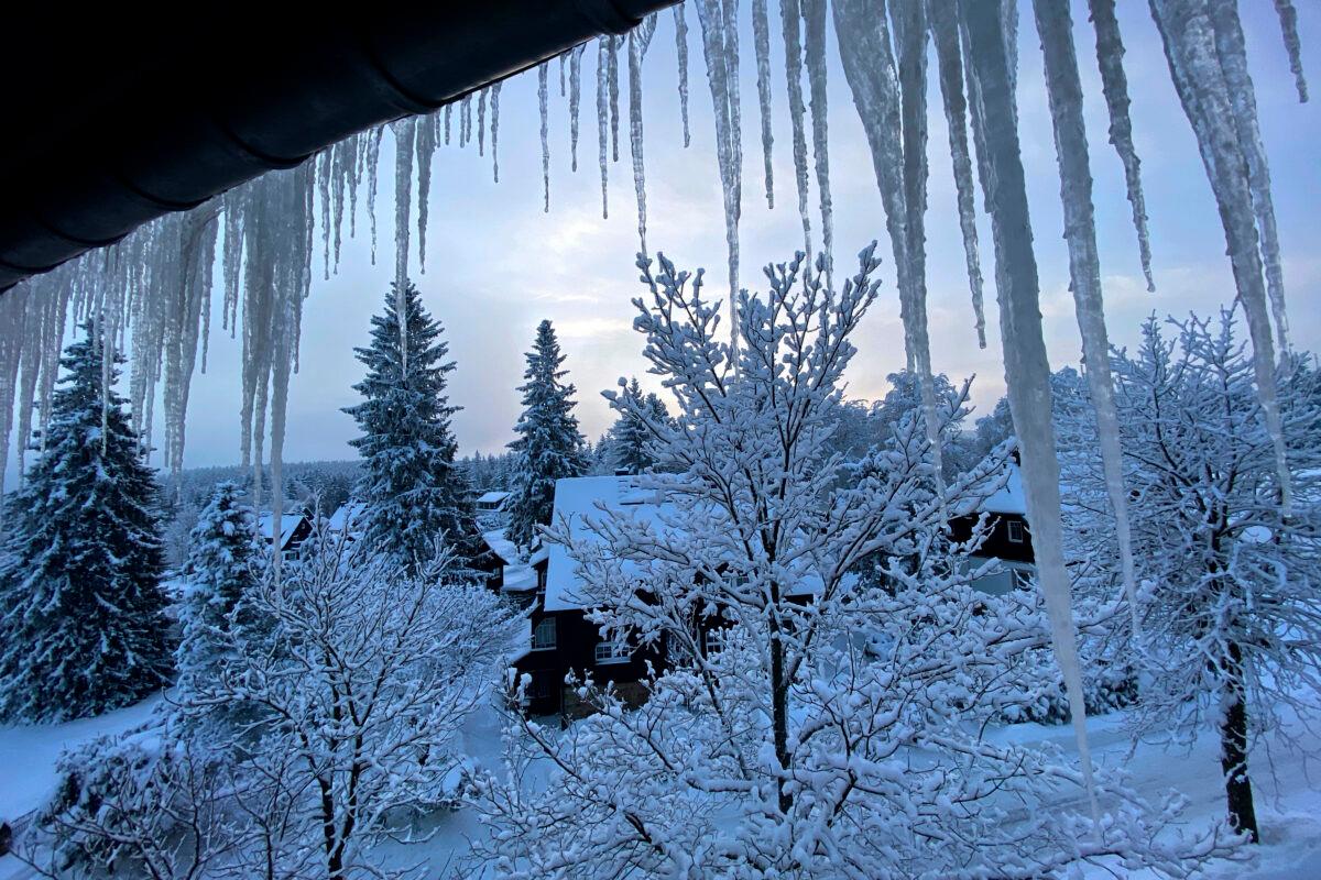Icicles form on a window outside a house early morning in Altenberg, Germany, on Feb. 10, 2021. (AP Photo/Matthias Schrader)