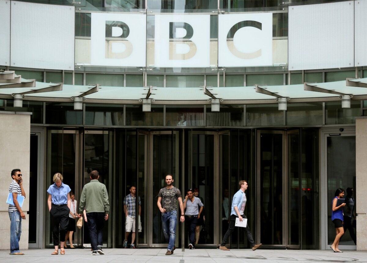 People arrive and depart from Broadcasting House, the headquarters of the BBC in London, Britain, on July 2, 2015. (Paul Hackett/Reuters)