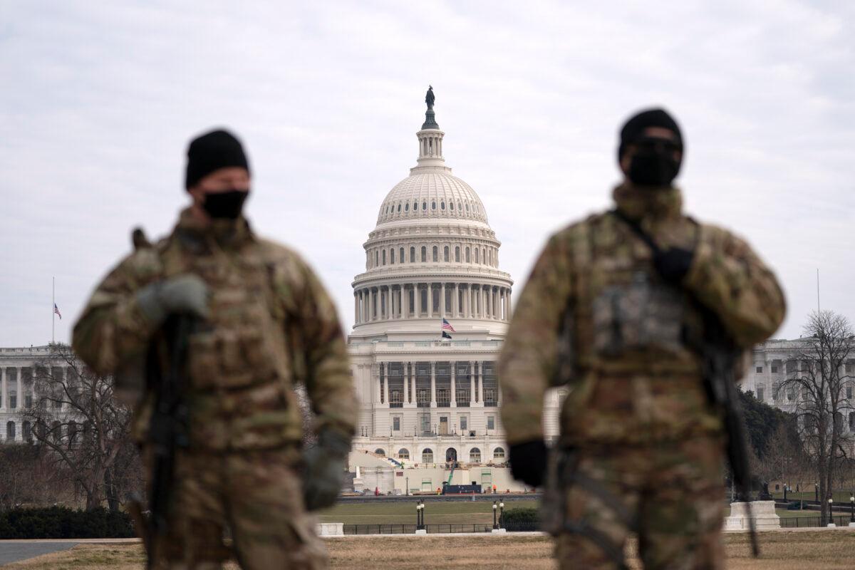 Members of the National Guard patrol the area outside of the U.S. Capitol during the impeachment trial of former President Donald Trump at the Capitol in Washington on Feb. 10, 2021. (Jose Luis Magana/AP Photo)