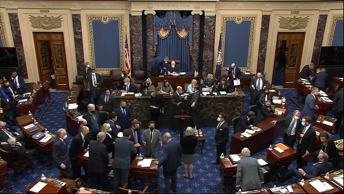 Senators are seen during the impeachment trial against former President Donald Trump, in Washington on Feb. 10, 2021. (Senate Television via AP)