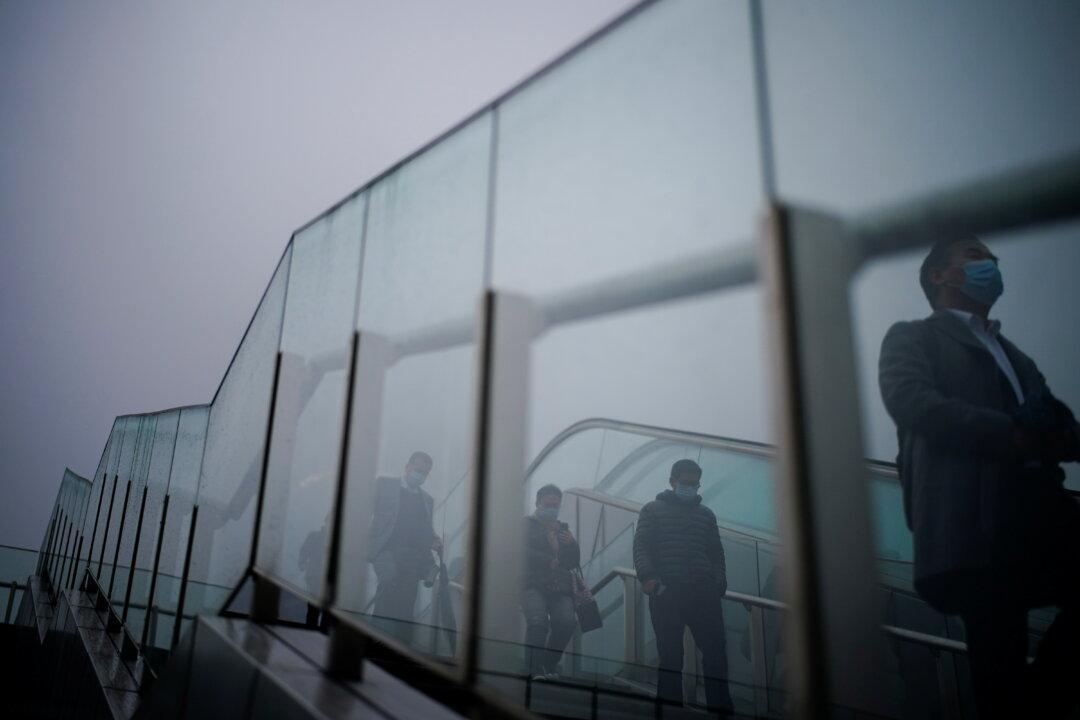 China Refused to Provide WHO Team With Raw Data on Early COVID Cases, Team Member Says