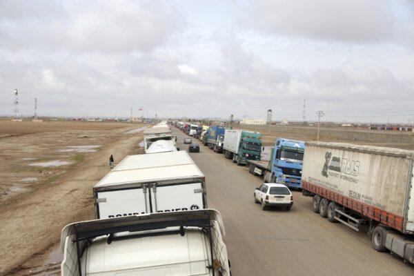 Fuel tankers and trucks are parked on the road at the Islam Qala border with Iran, in Herat Province, west of Kabul, Afghanistan on Feb. 20, 2019. (Rahmat Gul/AP Photo)