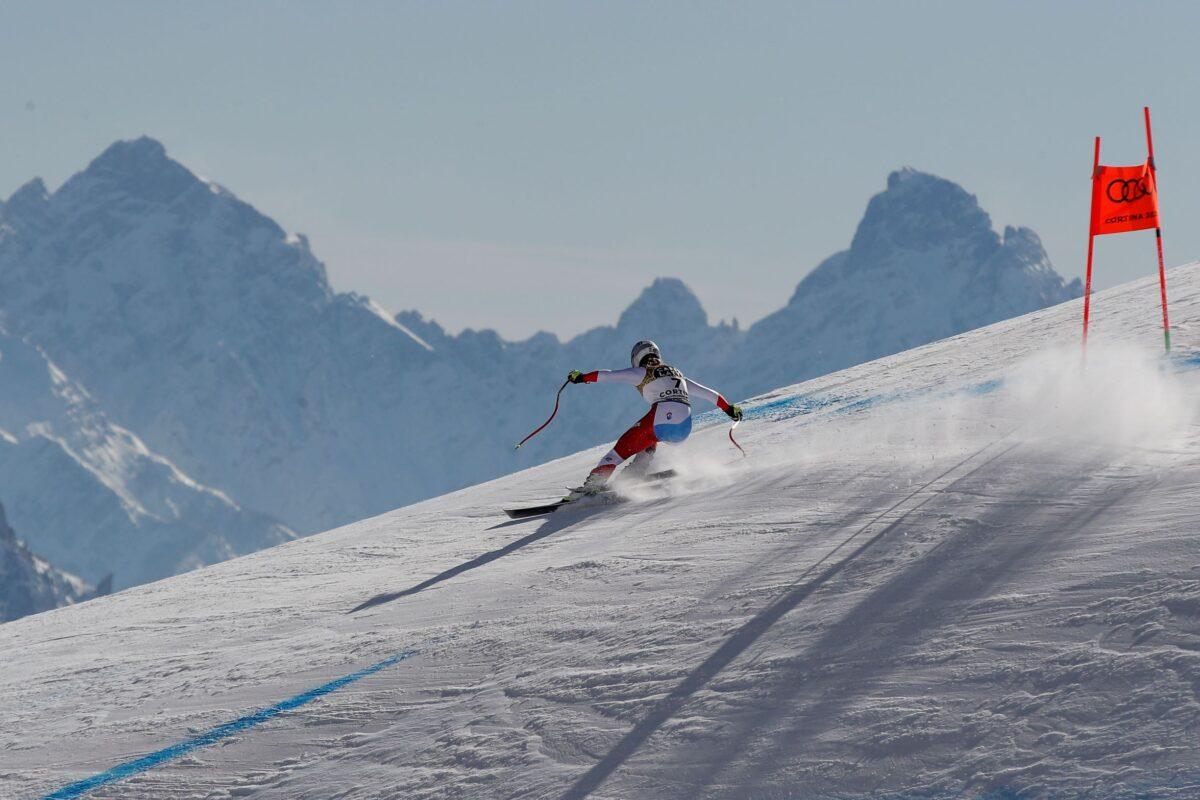 Switzerland's Corinne Suter speeds down the course on her way to win the women's downhill, at the alpine ski World Championships in Cortina d'Ampezzo, Italy, on Feb.13, 2021. (Gabriele Facciotti/AP Photo)