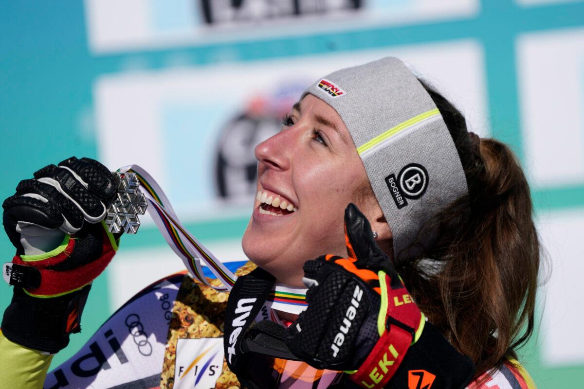 Silver medal Germany's Kira Weidle holds the silver medal after the women's downhill, at the alpine ski World Championships in Cortina d'Ampezzo, Italy, on Feb. 13, 2021. (Giovanni Auletta/AP Photo)