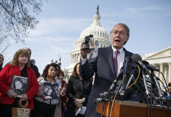 Sen. Edward J. Markey, D-Mass., displays a GM ignition switch similar to those linked to 13 deaths and dozens of crashes of General Motors small cars like the Chevy Cobalt, during a news conference on Capitol Hill in Washington on April 1, 2014. (J. Scott Applewhite/AP Photo)