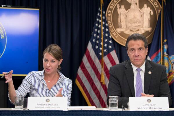Secretary to the Governor Melissa DeRosa, is joined by New York Gov. Andrew Cuomo during a news conference, in New York, on Sept. 14, 2018. (AP Photo/Mary Altaffer, File)