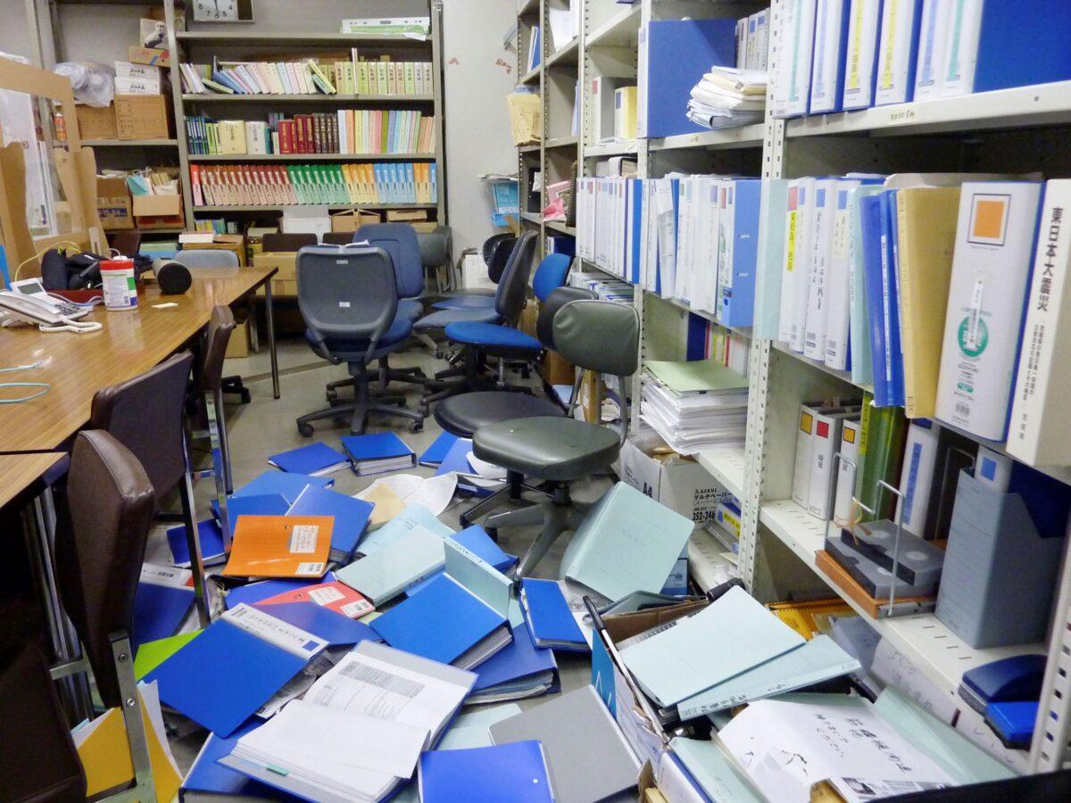 Files are scattered following an earthquake at a meeting room of Kyodo News Sendai branch office in Sendai, Miyagi prefecture, northeastern Japan, on Feb. 13, 2021. (Kyodo News via AP)