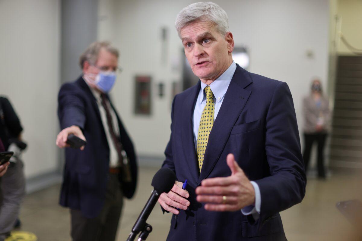 Sen. Bill Cassidy (R-La.) talks to reporters in the U.S. Senate subway as Cassidy heads to the Senate Chamber to attend the impeachment trial of former President Donald Trump on Capitol Hill in Washington on 11, 2021. (Jonathan Ernst/Reuters)