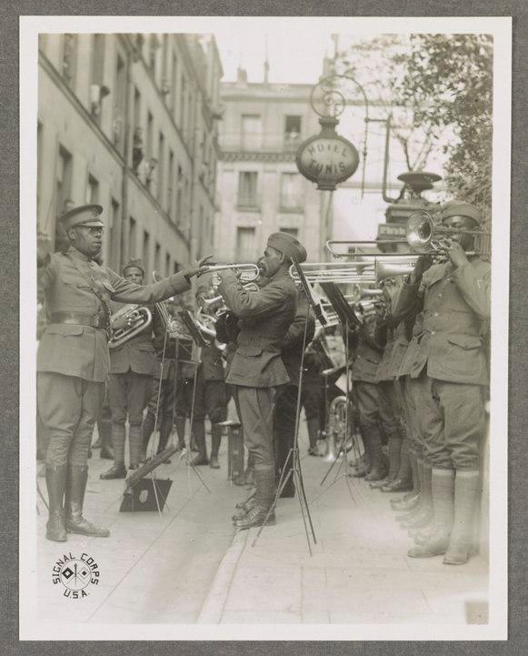 The 369th Infantry Regiment band played jazz for American wounded in the courtyard of a Paris hospital in 1918. (Library of Congress)