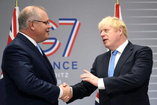British Prime Minister Boris Johnson (R) meets Australian Prime Minister Scott Morrison (L) for their bilateral talks during the G7 Summit in Biarritz, France on Aug. 24, 2019. (Neil Hall - Pool/Getty Images)