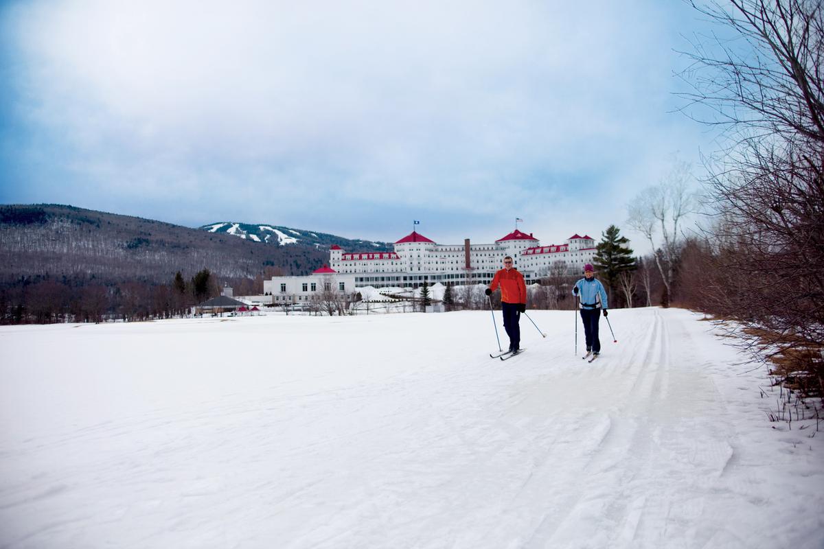 A cross-country ski outing, with the Omni Mount Washington Resort in the background. (Courtesy of Omni Mount Washington Resort)
