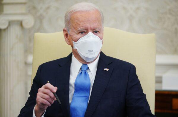 President Joe Biden speaks during a meeting with a bipartisan group of governors and mayors on his COVID-19 relief plan, in the Oval Office of the White House in Washington on Feb.12, 2021. (Mandel Ngan/AFP via Getty Images)