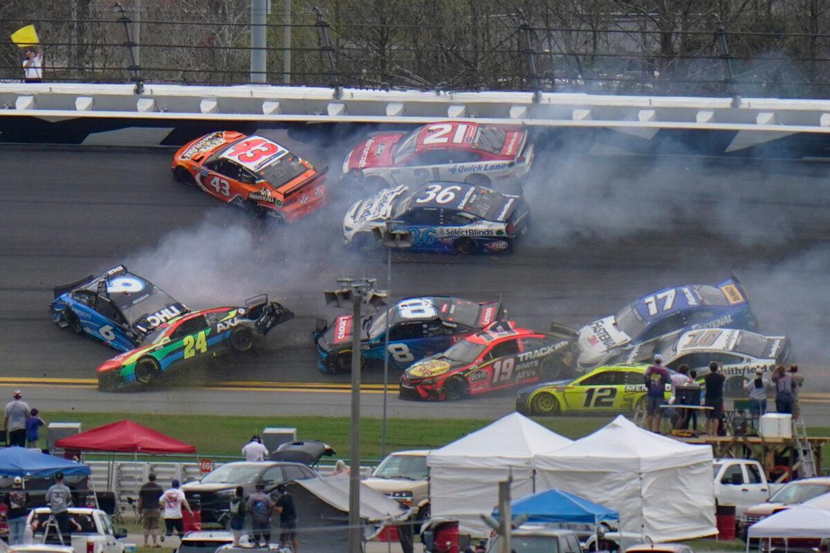 Cars collide on the 14th lap during the NASCAR Daytona 500 auto race at Daytona International Speedway, in Daytona Beach, Fla., on Feb. 14, 2021. (Chris O'Meara/AP Photo)