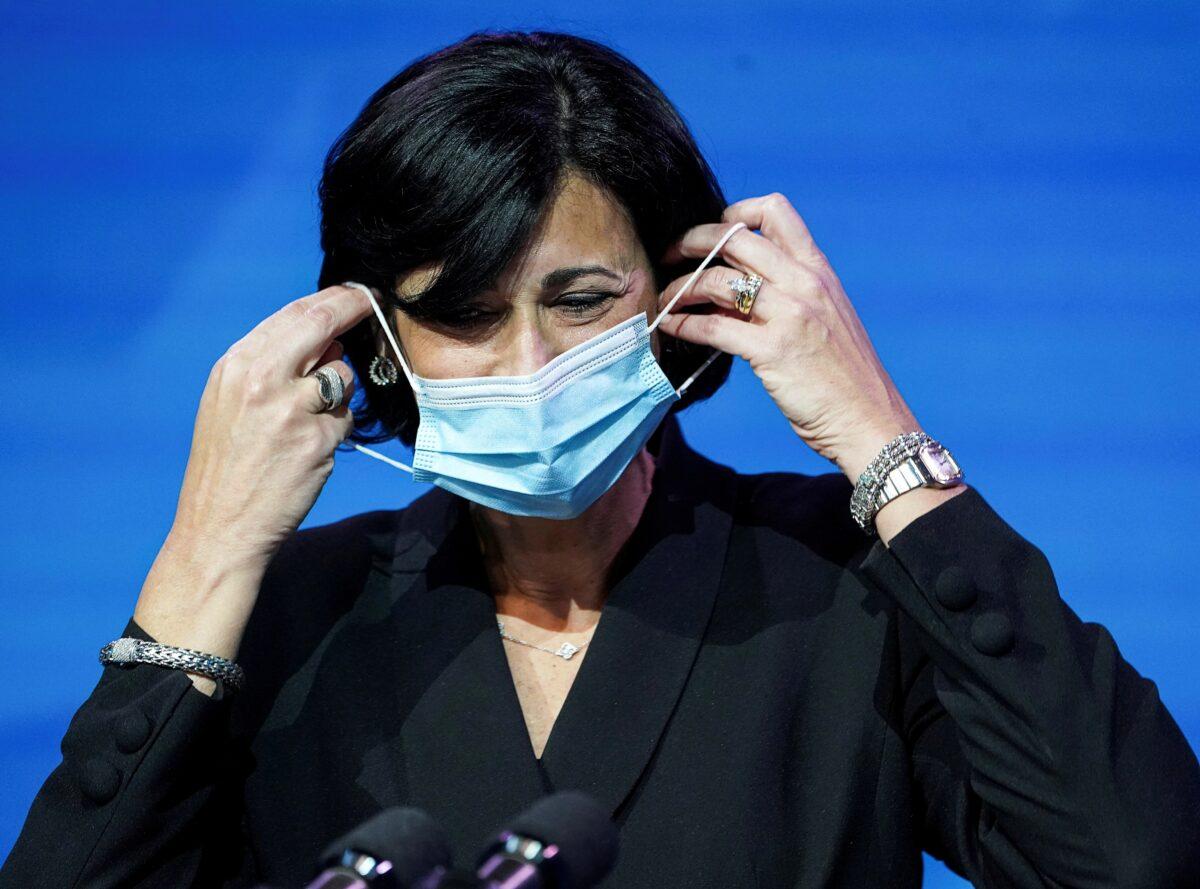 Dr. Rochelle Walensky, now the director of the Centers for Disease Control and Prevention (CDC), removes her mask to speak as then-President-elect Joe Biden announces nominees and appointees to serve on his health and CCP virus response teams during a news conference at his transition headquarters in Wilmington, Del., on Dec. 8, 2020. (Kevin Lamarque/Reuters)