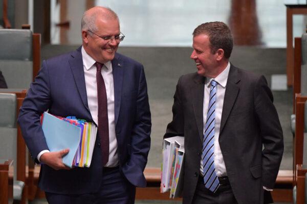 Australian Prime Minister Scott Morrison speaks with Minister for Education Dan Tehan during Question Time in the House of Representatives on February 03, 2021 in Canberra, Australia. (Sam Mooy/Getty Images)