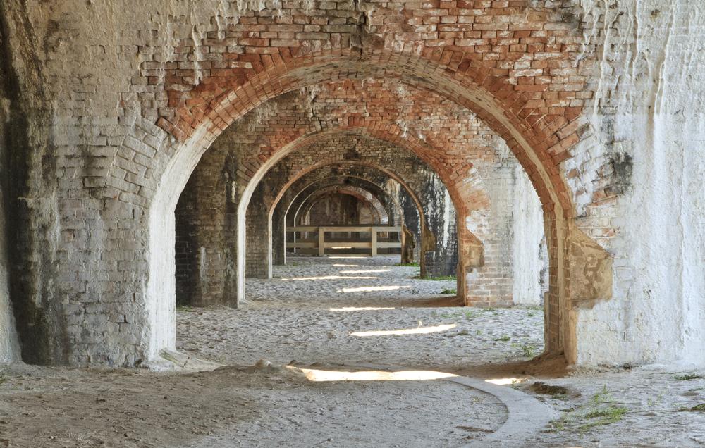 Weathered brick arches at Fort Pickens. (Colin D. Young/Shutterstock)