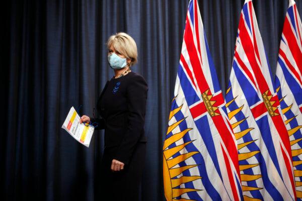 Dr. Bonnie Henry leaves the podium after talking about the next steps in B.C.'s COVID-19 Immunization Plan during a press conference at Legislature in Victoria, B.C., Canada, on Jan. 22, 2021. (Chad Hipolito/The Canadian Press)